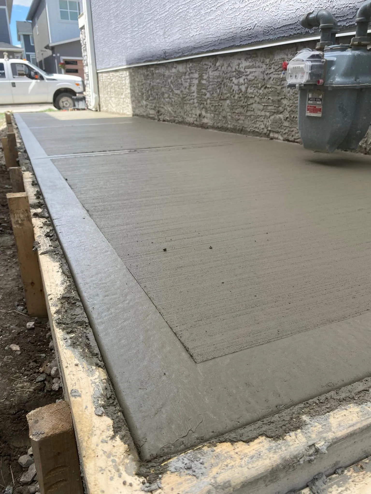 Broom Finish concrete surface by Urban Stone Construction Calgary