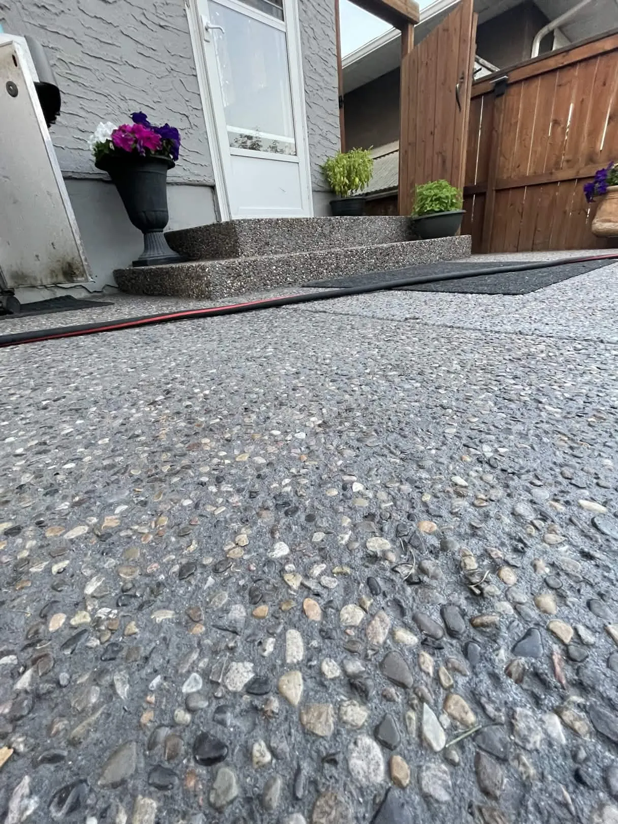 Exposed Aggregate concrete surface by Urban Stone Construction Calgary